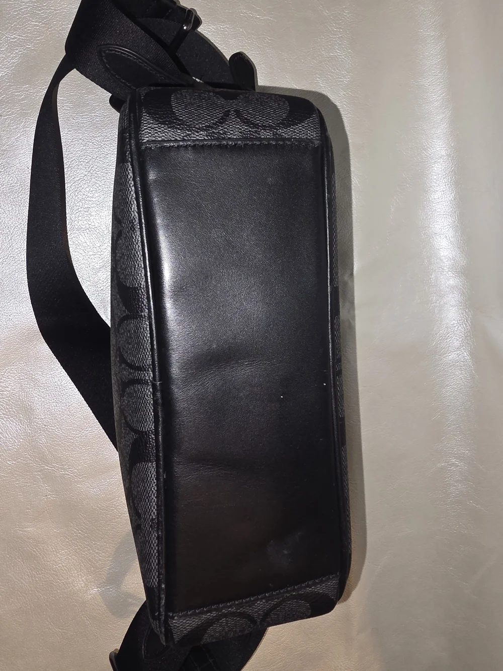 Coach Graham Crossbody bag in Charcoal Black signature coated canvas.
